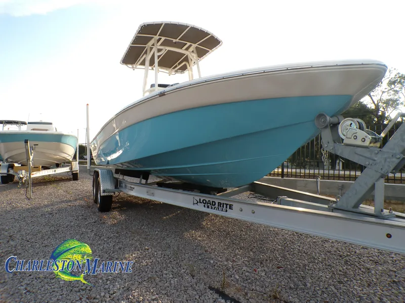 Slide: The Image of 2023 NauticStar 227 XTS boat on trailer at Charleston Marine dealership. - 0
