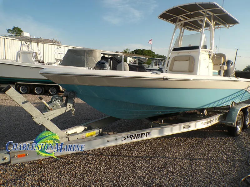 Slide: The Image of 2023 NauticStar 227 XTS boat on trailer at Charleston Marine dealership. - 1
