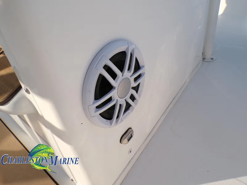 Slide: The Image of 2023 NauticStar 227 XTS boat speaker detail, Charleston Marine logo visible. - 17