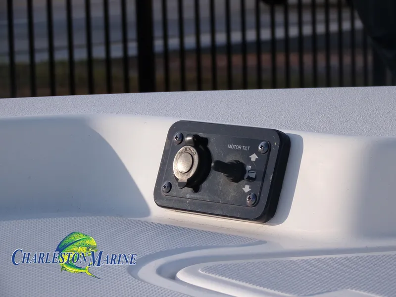 Slide: The Image of 2023 NauticStar 227 XTS boat motor tilt control panel. - 24