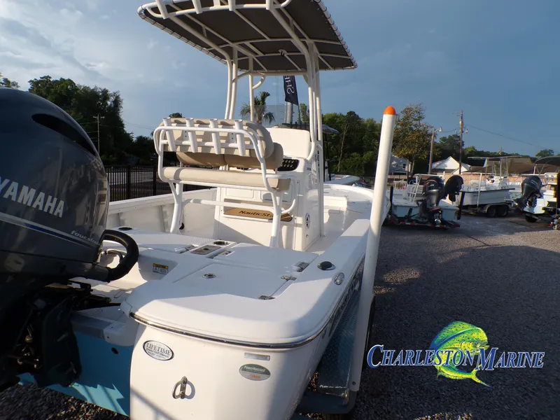 Slide: The Image of 2023 NauticStar 227 XTS boat with Yamaha engine at Charleston Marine dealership. - 5