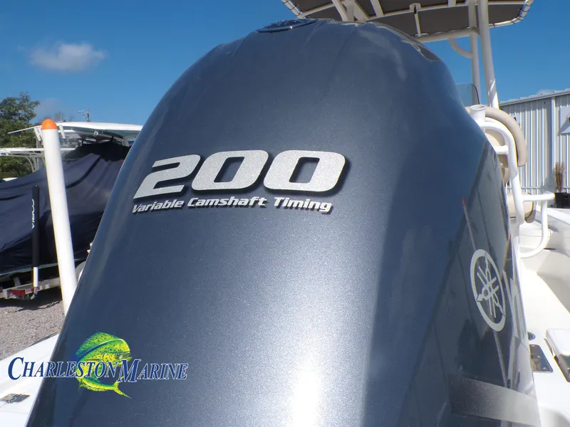 Slide: The Image of 2023 NauticStar 227 XTS with Yamaha 200 engine, featuring variable camshaft timing. - 6