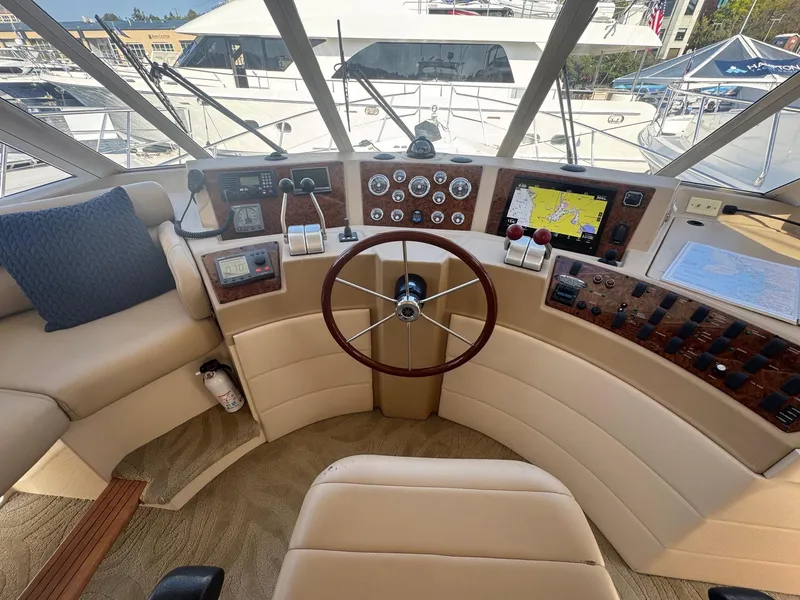 Slide: The Image of Pilothouse of 2004 Meridian 490 yacht with steering wheel and navigation instruments. - 12