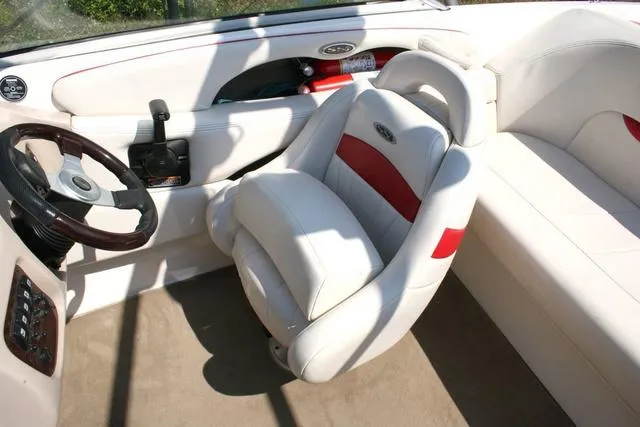 Slide: The Image of Interior of a 2000 Chaparral 186 SSi boat with white and red seating. - 10