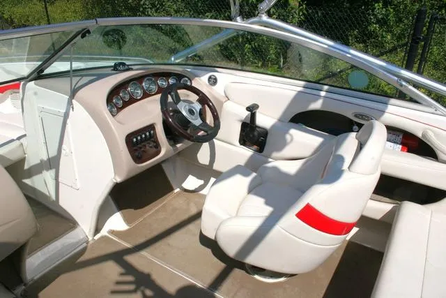 Slide: The Image of Interior of 2000 Chaparral 186 SSi boat with steering wheel and dashboard controls. - 6