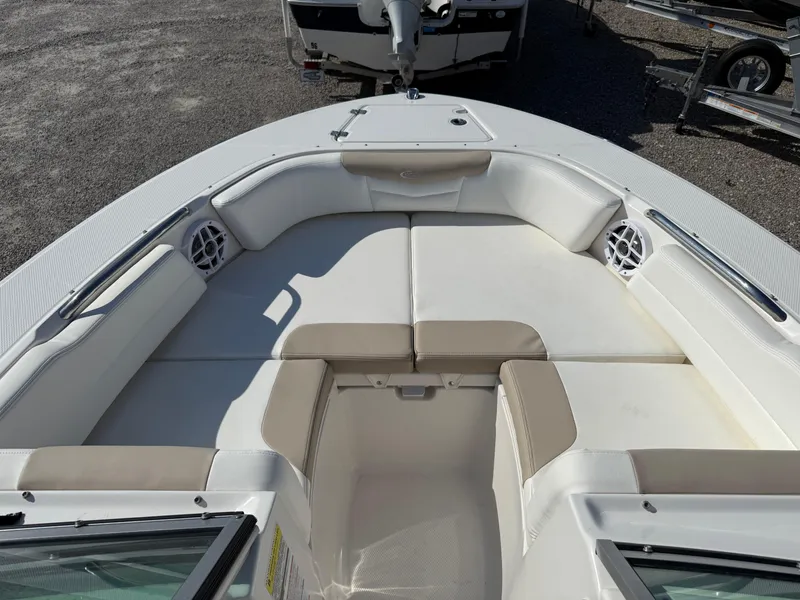 Slide: The Image of 2024 Robalo R207 Dual Console boat with spacious seating and modern design. - 12