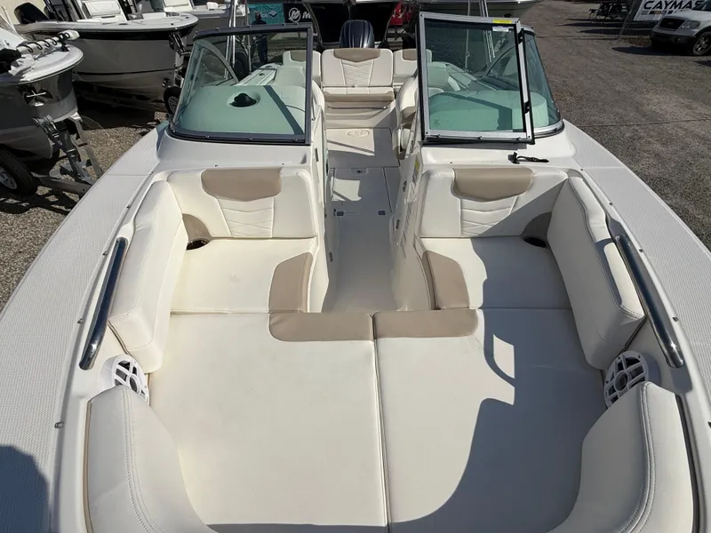 Slide: The Image of 2024 Robalo R207 Dual Console boat with spacious seating and modern design. - 13