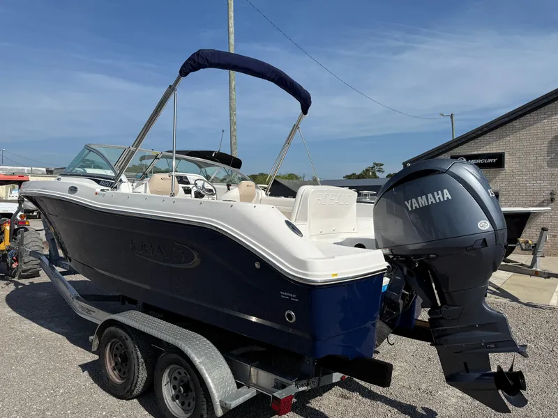 Slide: The Image of 2024 Robalo R207 Dual Console boat with Yamaha engine on trailer. - 5