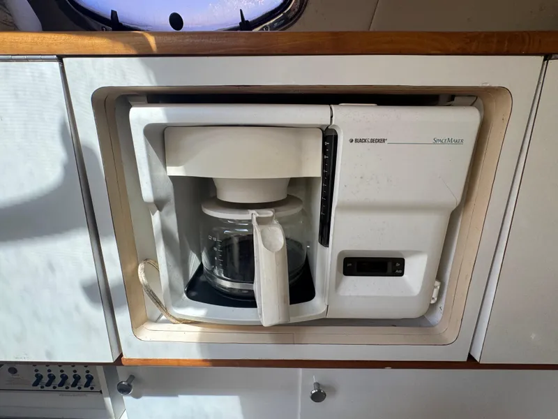 Slide: The Image of Built-in coffee maker on 1999 Chaparral 290 Signature Cruiser yacht kitchen. - 32