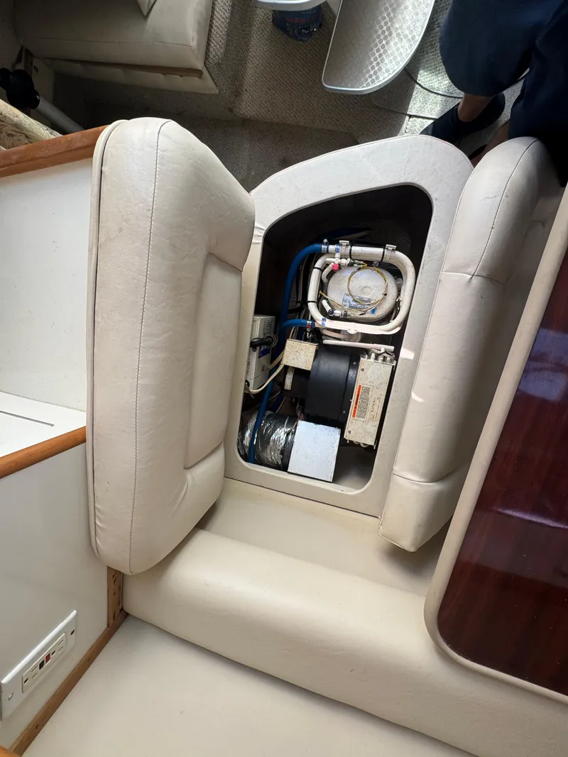 Slide: The Image of 1999 Chaparral 290 Signature Cruiser interior with engine compartment exposed. - 45