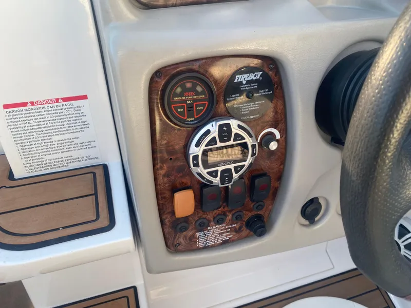 Slide: The Image of Control panel of a 2011 Ebbtide 2700 Cuddy Bow Rider boat. - 16