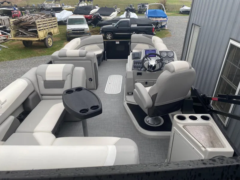 Slide: The Image of 2023 SunChaser Eclipse 8523 SBX pontoon boat with spacious seating and modern helm. - 14