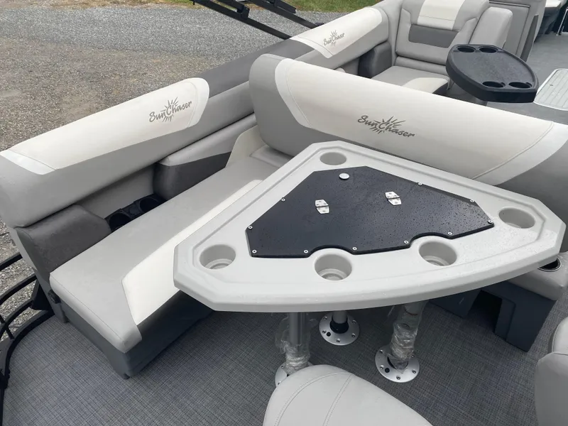 Slide: The Image of 2023 SunChaser Eclipse 8523 SBX pontoon boat interior with seating and table. - 15