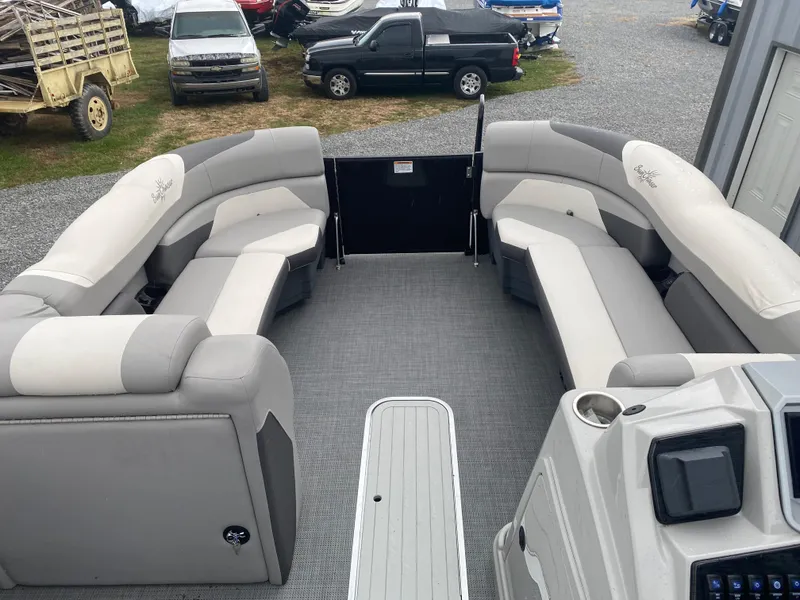 Slide: The Image of 2023 SunChaser Eclipse 8523 SBX pontoon boat interior with spacious seating and modern design. - 24