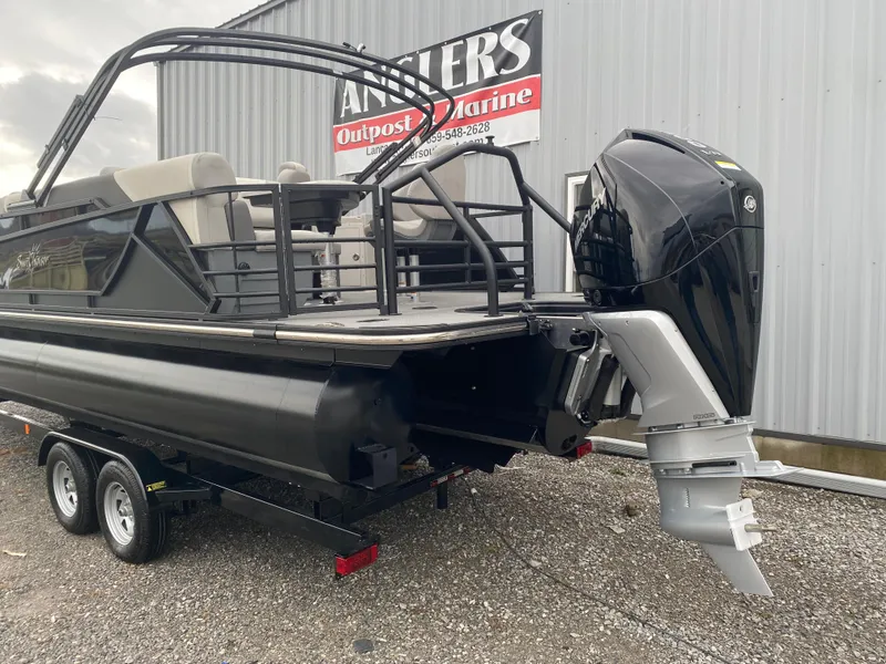 Slide: The Image of 2023 SunChaser Eclipse 8523 SBX pontoon boat with outboard motor on trailer. - 6