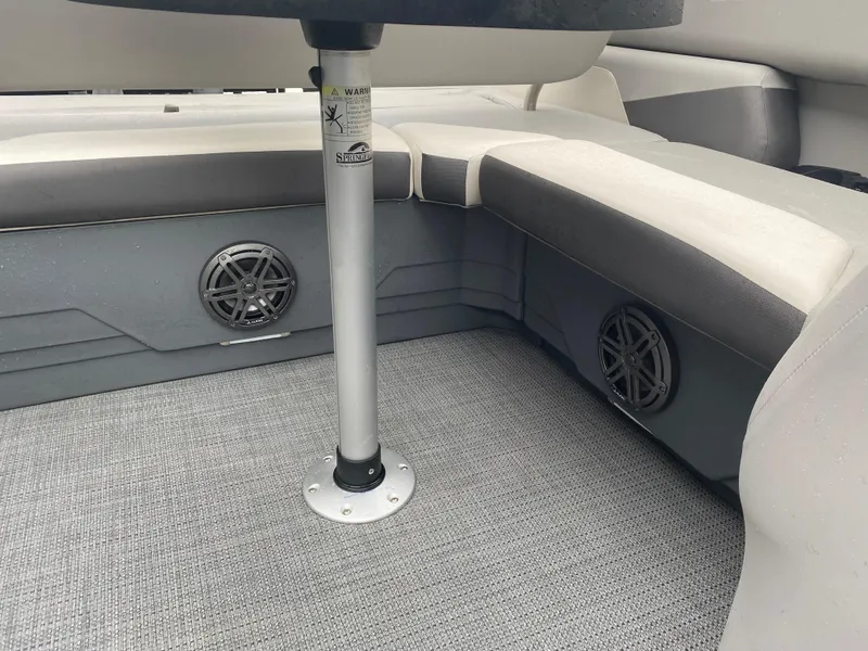 Slide: The Image of Interior of 2023 SunChaser Eclipse 8523 SBX boat with seating and speakers. - 8