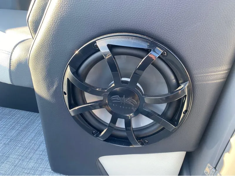 Slide: The Image of 2024 Trifecta 23 RFS 3.0 boat speaker, black grille, leather upholstery. - 11