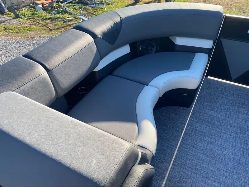 Slide: The Image of Luxurious seating on 2024 Trifecta 23 RFS 3.0 pontoon boat, featuring sleek gray upholstery. - 17