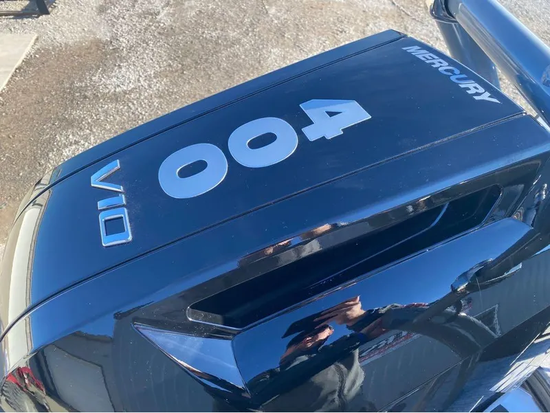 Slide: The Image of Close-up of a Mercury V10 outboard engine on a 2024 Trifecta 23 RFS 3.0 boat. - 26