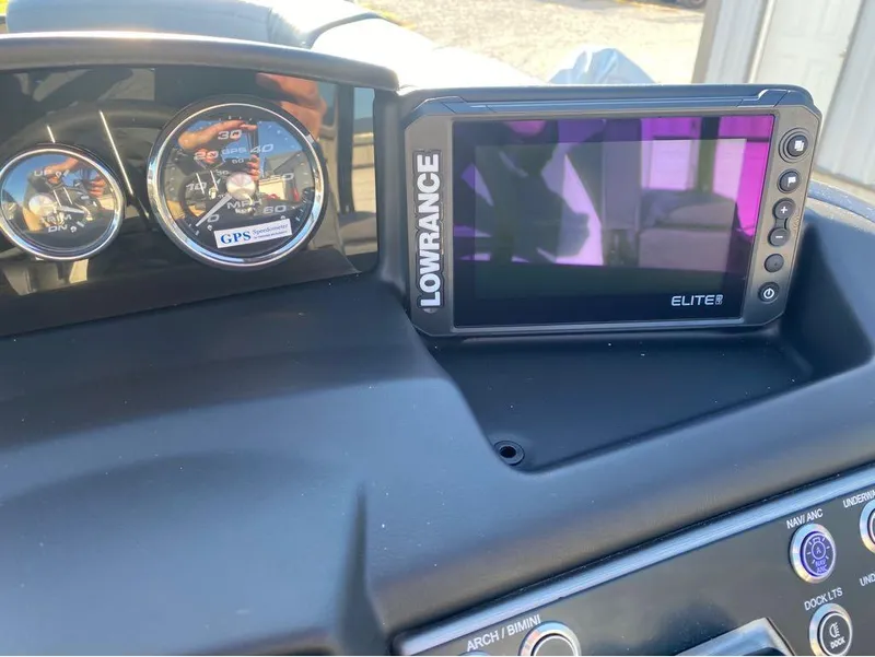 Slide: The Image of Dashboard of 2024 Trifecta 23 RFS 3.0 with Lowrance Elite GPS and speedometer. - 29