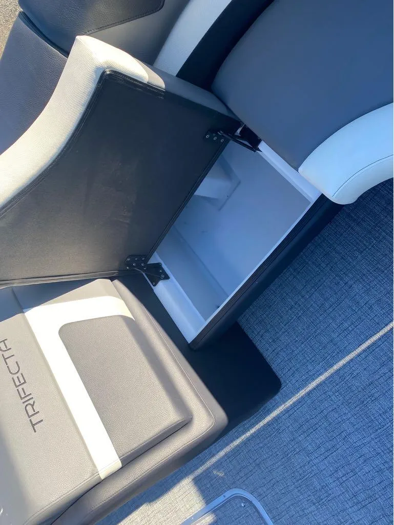 Slide: The Image of Open storage compartment in 2024 Trifecta 23 RFS 3.0 boat seat. - 31