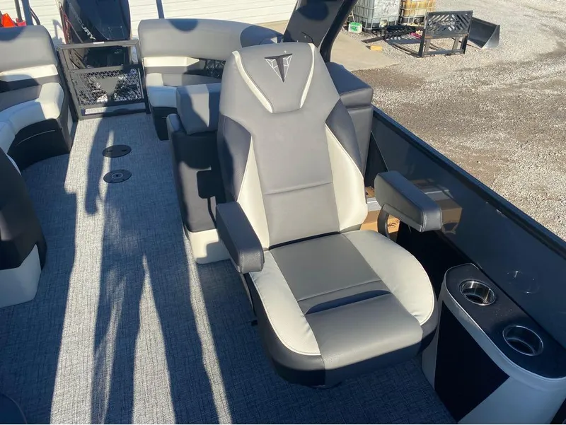 Slide: The Image of 2024 Trifecta 23 RFS 3.0 boat interior with gray seating and cup holders. - 35