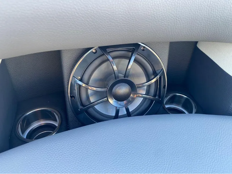 Slide: The Image of Speaker and cup holders in 2024 Trifecta 23 RFS 3.0 boat interior. - 5