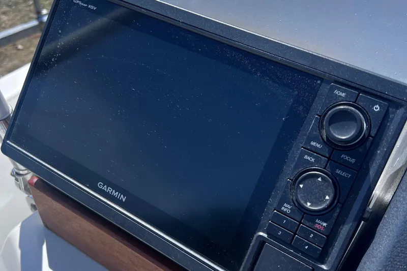 Slide: The Image of Garmin navigation system on 2009 Boston Whaler 200 Dauntless boat dashboard. - 10