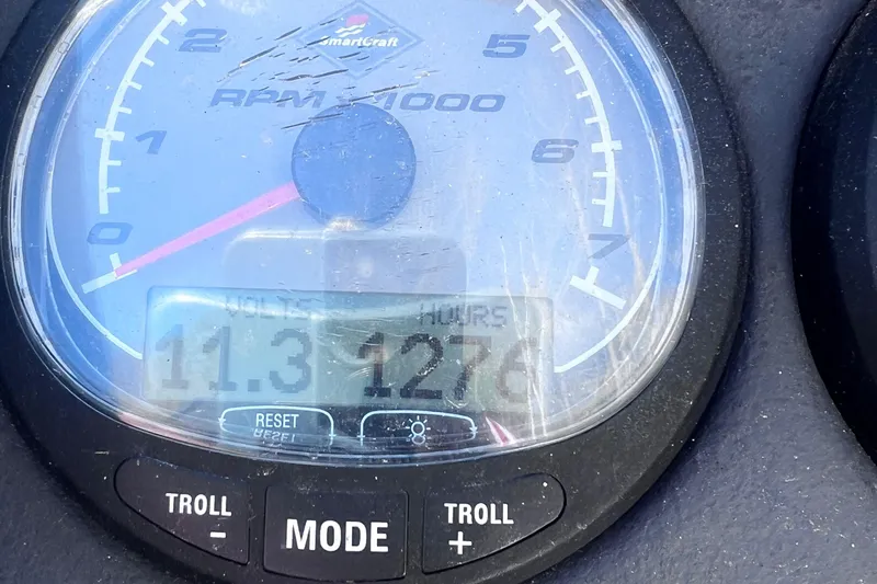 Slide: The Image of Close-up of a 2009 Boston Whaler 200 Dauntless boat tachometer displaying 1276 hours. - 16