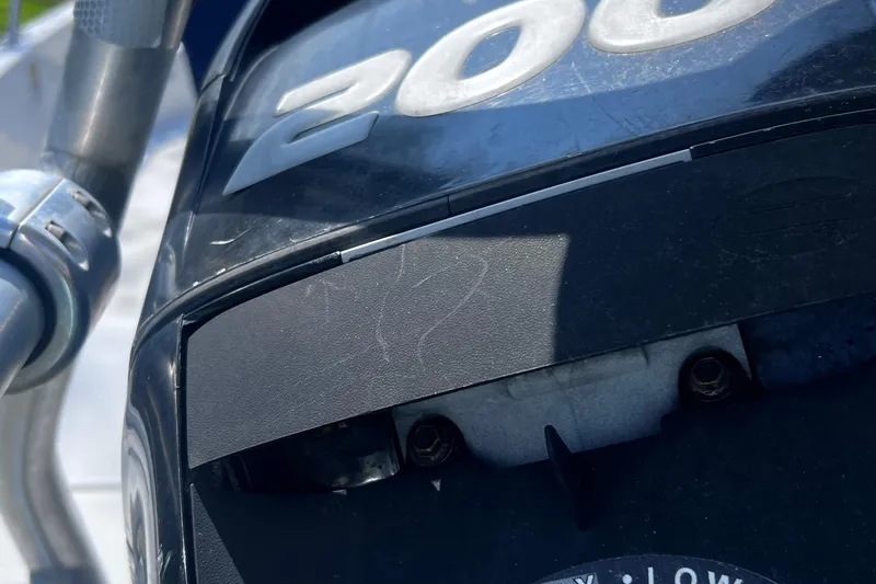 Slide: The Image of Close-up of a 2009 Boston Whaler 200 Dauntless boat engine detail. - 20