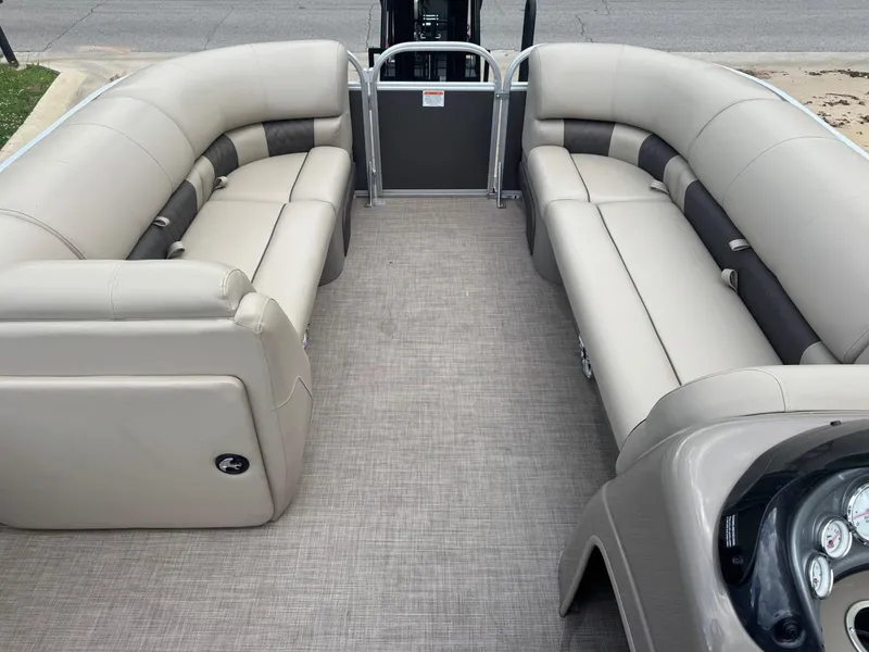 Slide: The Image of 2023 Sun Tracker Party Barge 20 DLX interior with spacious seating and modern design. - 7
