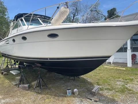 Slide: The Image of 1994 Tiara Yachts 3100 Open on stands, ready for maintenance. - 2