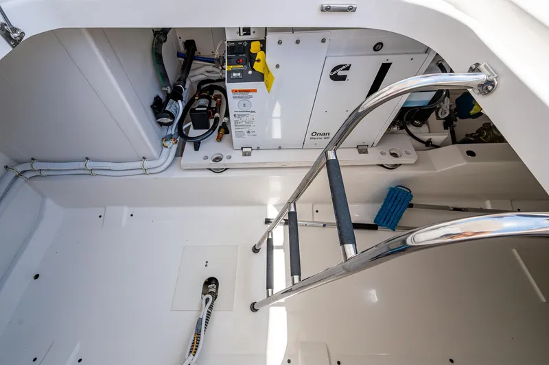 Slide: The Image of Engine compartment of 2024 Tiara Yachts 38 LS with ladder and equipment. - 41