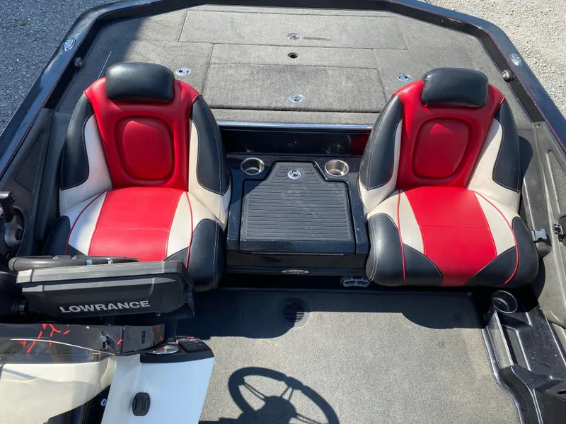 Slide: The Image of 2017 Ranger Z520C Comanche boat interior with red and black seats, Lowrance equipment visible. - 15