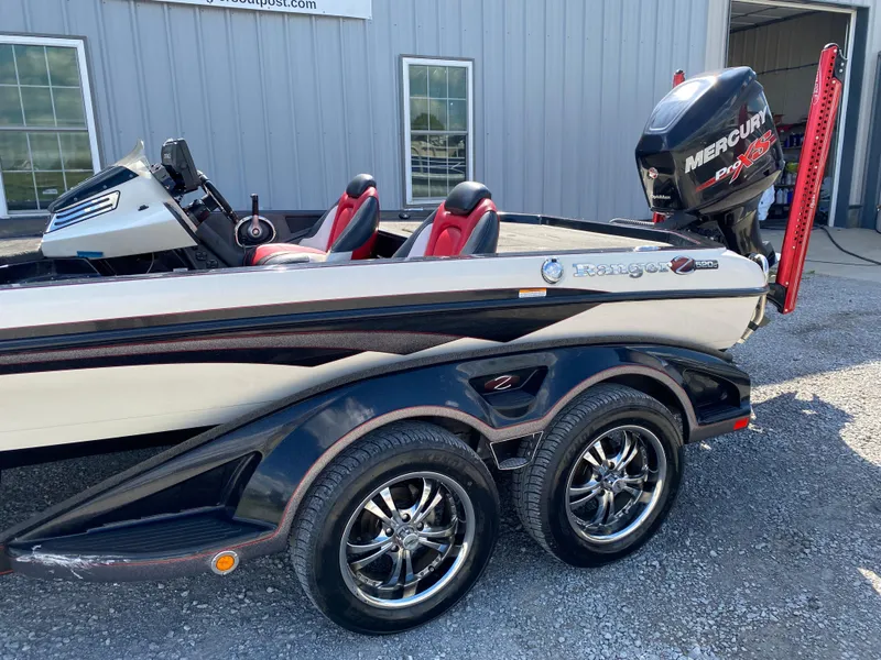 Slide: The Image of 2017 Ranger Z520C Comanche boat with dual axle trailer and Mercury engine. - 5