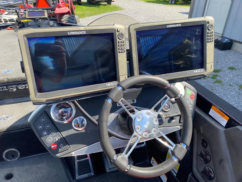 Slide: The Image of Steering console of 2017 Ranger Z520C Comanche with dual Lowrance HDS12 displays. - 9