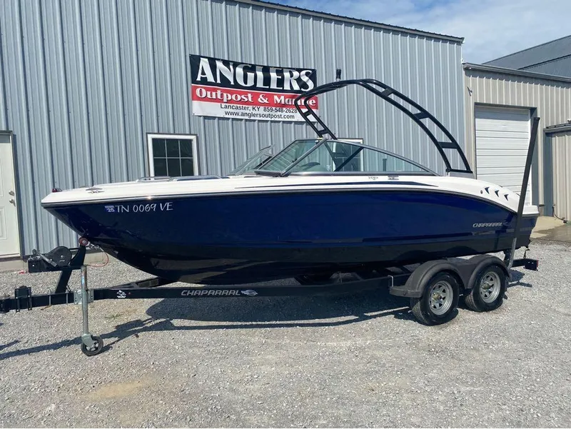 Slide: The Image of 2018 Chaparral 21 H2O Sport boat on trailer outside Anglers Outpost & Marine. - 8