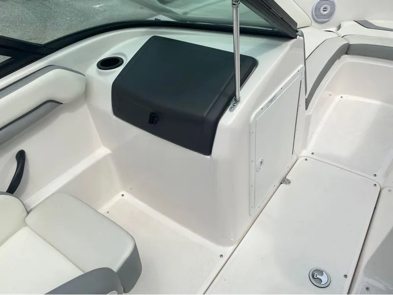 Slide: The Image of 2017 Yamaha Boats SX190 interior with seating and storage compartment. - 14
