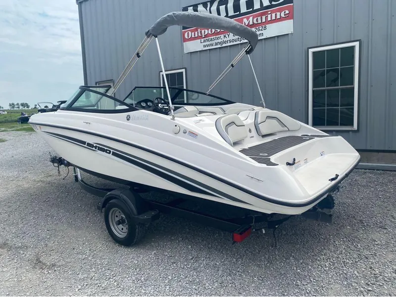 Slide: The Image of 2017 Yamaha SX190 boat on trailer outside marine dealership. - 6