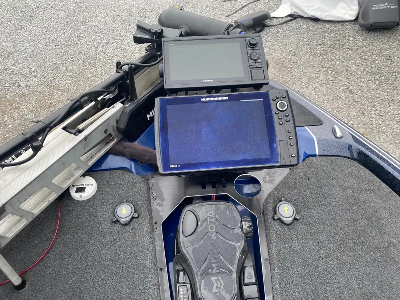 Slide: The Image of 2020 Skeeter FXR20 Limited boat dashboard with navigation and fish-finding equipment. - 13