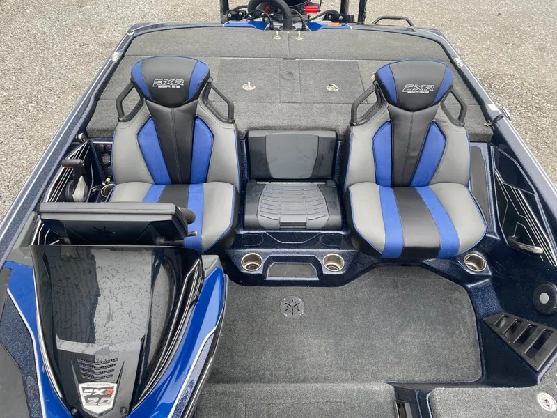 Slide: The Image of 2020 Skeeter FXR20 Limited boat interior with blue and gray seats. - 16