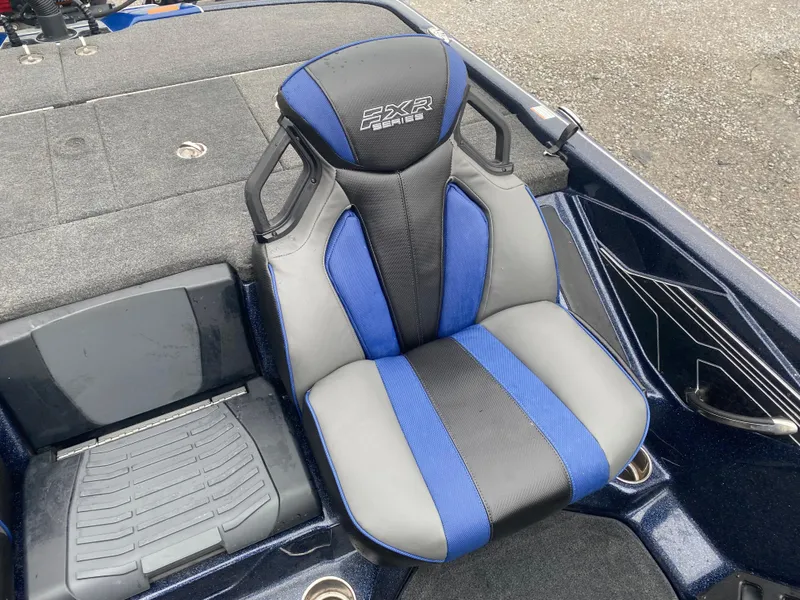 Slide: The Image of 2020 Skeeter FXR20 Limited boat seat with blue and gray design. - 18