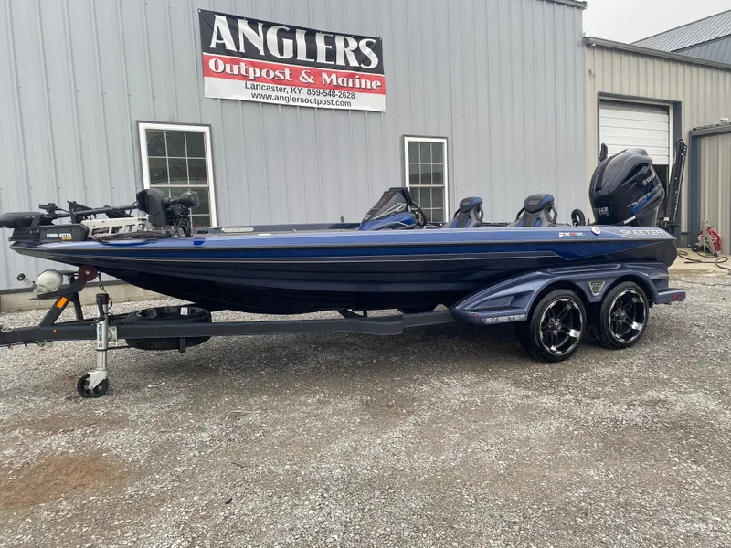 Slide: The Image of 2020 Skeeter FXR20 Limited boat at Anglers Outpost & Marine dealership. - 2