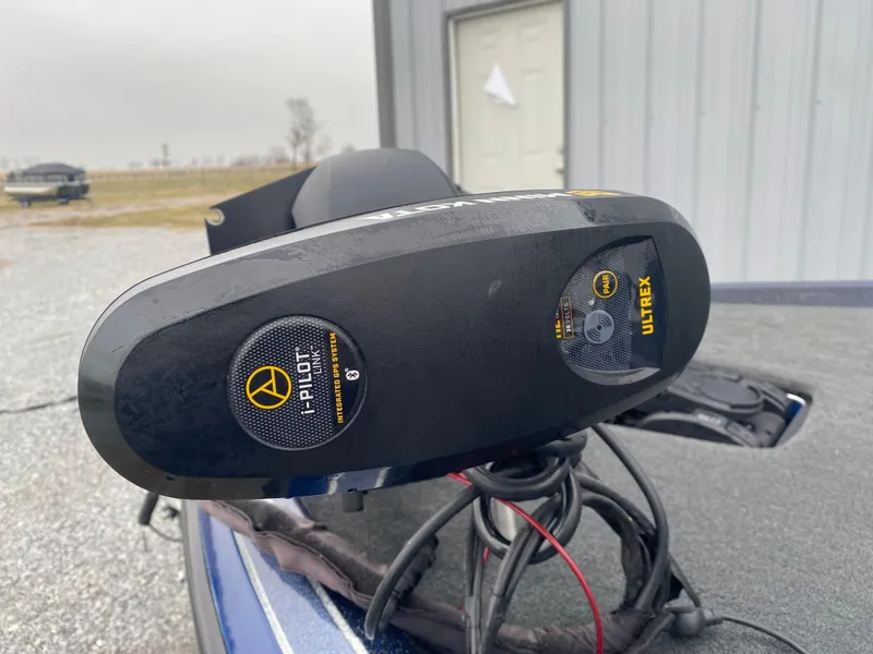 Slide: The Image of 2020 Skeeter FXR20 Limited boat with Minn Kota Ultrex trolling motor, parked outdoors. - 4