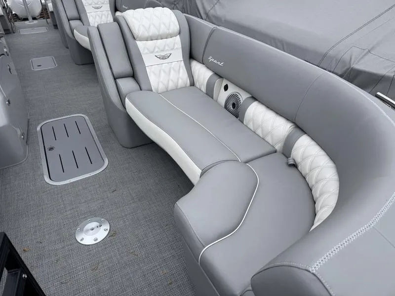 Slide: The Image of Luxurious seating on 2025 Bennington 25 QFBA boat with elegant gray and white upholstery. - 13