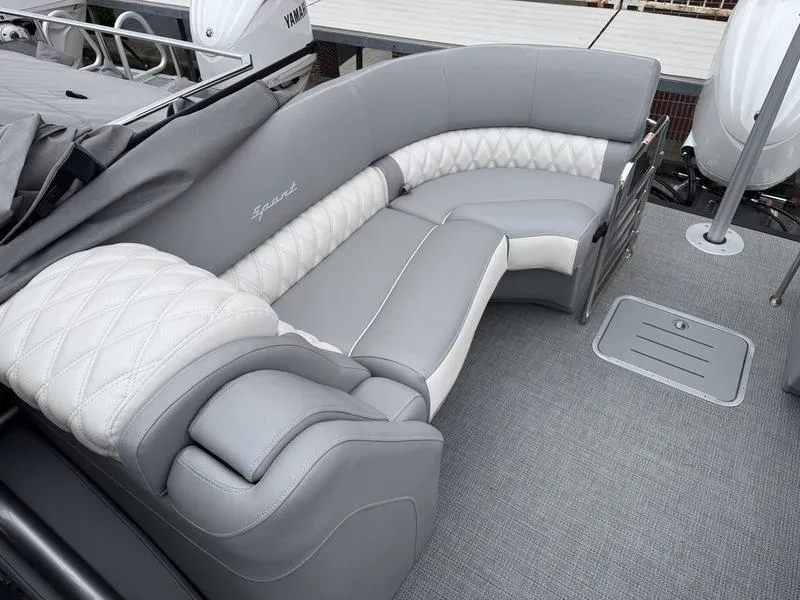 Slide: The Image of Luxurious seating on 2025 Bennington 25 QFBA pontoon boat, featuring elegant gray and white upholstery. - 4