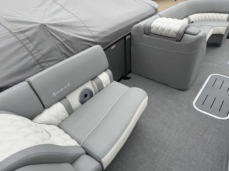 Slide: The Image of 2025 Bennington 25 QFBA boat interior with luxurious gray seating and modern design. - 8