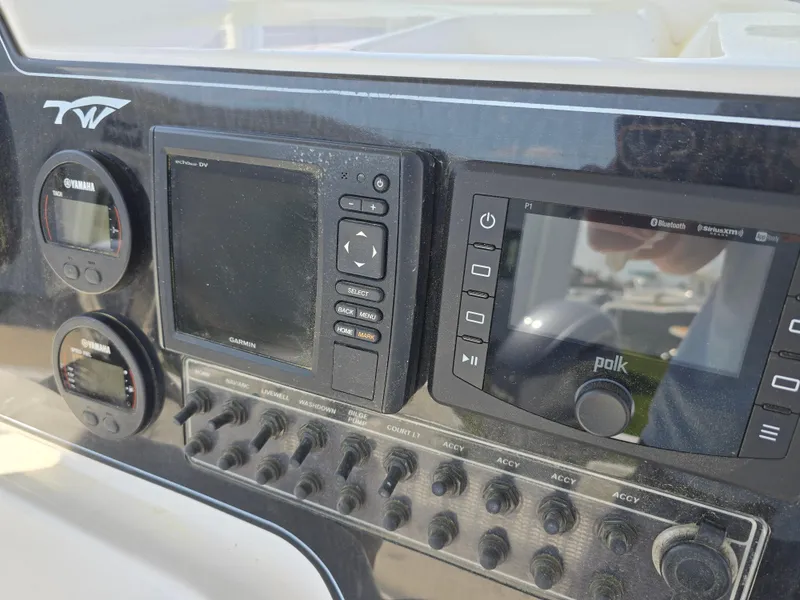 Slide: The Image of Control panel of a 2016 Tidewater 210 LXF boat with electronic displays. - 4