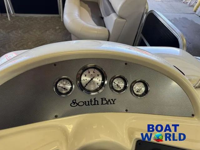 Slide: The Image of Dashboard of 2008 South Bay 20' Cruise Pontoon with gauges, featuring "Boat World" logo. - 28