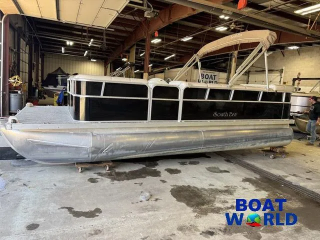 Slide: The Image of 2008 South Bay 20' Cruise Pontoon with Mercury 60HP in a warehouse setting. - 38